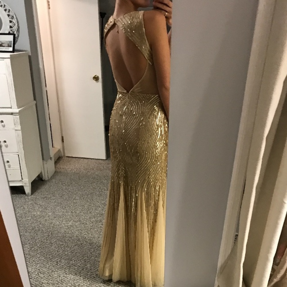 Adrianna Pappell gorgeous gold gown